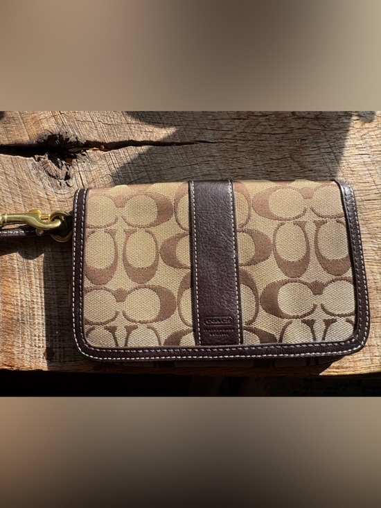 Coach Handbags - Coach Brown Signature Canvas Wristlet with Dark Brown Leather Trim